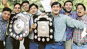 Sportspersons of Panjab University Campus in a jubilant mood after receiving prizes during the annual prize distribution function in Chandigarh on Wednesday. 