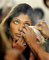 Vidisha, an Indian model, gets make-up done