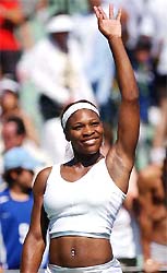 Serena Williams waves to the fans after defeating Jill Craybas at the Nasdaq-100 Open in Key Biscayne