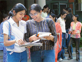 Students of Government College for Women, Ludhiana, discuss question paper after the examination