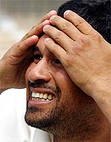 Sachin Tendulkar reacts during the prize distribution ceremony following India's historic victory over Pakistan