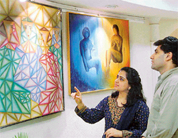 Prerna Behal with her work being displayed at IndusInd Bank Art Gallery in Sector 8, Chandigarh. 