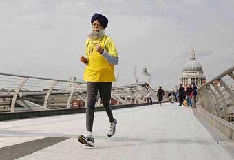 This year's oldest London Marathon runner, Fauja Singh, celebrates his 93rd birthday