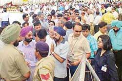 Members queue up to cast ballot during the Chandigarh Club elections on Saturday.