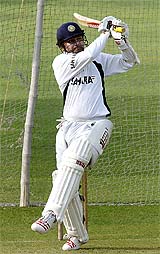Virender Sehwag hits a shot during a training session in Lahore 