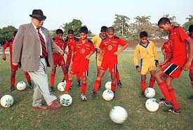 A file photo of Chandigarh Football Academy players with the former Punjab Governor, Lt-Gen JFR Jacob 