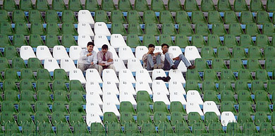 Spectators watch the opening day's play in Lahore on Monday