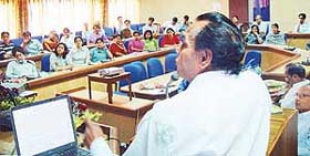 Prof R.N. Pandey, a scientist, addresses students at a seminar on "Atom for Peace" at Panjab University in Chandigarh