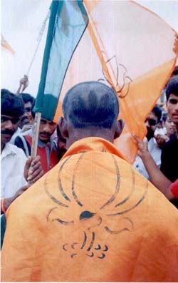 A BJP activist with his head shaved in the shape of a �lotus� at a party procession in Chikmangalur 