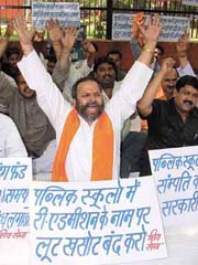 Activists of Shiv Sena during the protest against the proposed fee hike of public schools at Jantar Mantar in the Capital on Tuesday. 