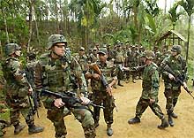 Indian and US soldiers take part in a joint military exercise at Kumbhirgram, in Mizoram