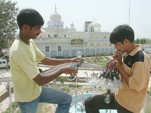 Workers give final touches to Khadoor Sahib Gurdwara for the 500th birth anniversary of Guru Angad Dev to be celebrated from April 13 to 18.
