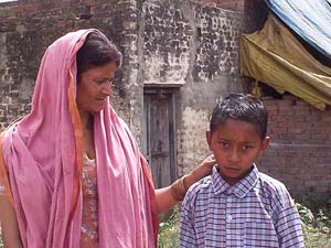 Krishan, the boy with a hole in the heart with his mother Sunita at Badungar in Patiala.