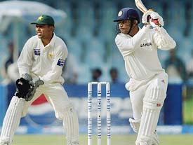 Virender Sehwag hits a shot during his unbeaten knock of 86 