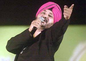 Punjabi pop singer Daler Mehndi performs at a musical nite
