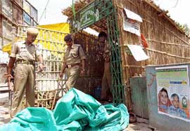 CRPF jawans in front of the RJD office in Gandhinagar in Patna where an RJD worker Raju Yadav was killed by unidentified gunmen on Saturday. 