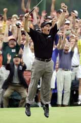 Phil Mickelson celebrates after winning the Masters golf tournament