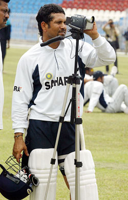 Sachin Tendulkar films his team-mates during a training session in Rawalpindi