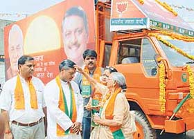 Ms Vidyawati Jain, mother of Mr Satya Pal Jain, Bharatiya Janata Party candidate in the forthcoming poll, puts a �tilak� on the forehead of her son