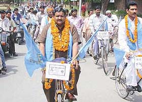 Members of the Bharatiya Valmiki Dharam Samaj take out a chetna cycle rally