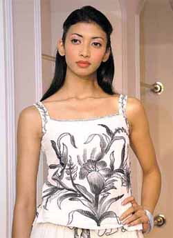 A catwalker sporting an outfit of Adarsh Gill during the launch of Spring Summer Collection 2004 at a fashion show in the Capital.