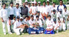 The Vikaspuri Coaching Centre cricket team, who won the R C Sharma Memorial Cricket Tournament Trophy