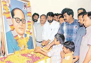 Functionaries of the Bhartiya Valmiki Dharam Samaj offer floral tributes to Dr B.R. Ambedkar on his 113th birth anniversary at a function in Valmiki Bhavan in Ludhiana on Wednesday.