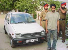 Dr Mehtab Singh, accused of stealing a car, in the custody of the Government Railway Police in Ludhiana 