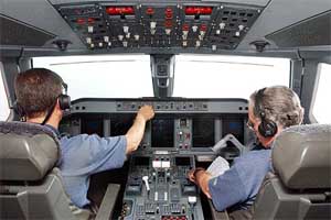 The view of the cockpit of an Embraer 170 commercial aircraft 