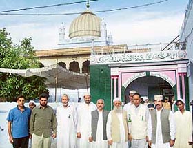 Members of a Pakistan delegation come out of Rauza Sharif in Fatehgarh Sahib on Friday.