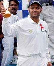 India's Virender Sehwag with the Man of the Series trophy