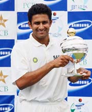 India's Anil Kumble with the Best Bowler of the Series trophy