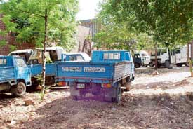 Green space in the backyard of the Government College of Art, Sector 10, in Chandigarh, is now being used to park heavy motor vehicles
