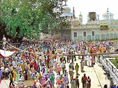 Devotees throng the historic Khadoor Sahib gurdwara at the special congregation held to mark the 500th birth anniversary celebrations of Guru Angad Dev in Khadoor Sahib in Amritsar district on Sunday.