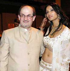 Noted author Salman Rushdie poses with his wife Padma Laxmi after their marriage in New York 