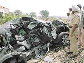 Mangled remains of a vehicle after it was hit by a train on the BRS Nagar-Shaheed Bhagat Singh Nagar railway crossing in Ludhiana