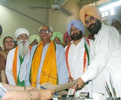 Mr R.L. Bhatia and Mr Sukhbinder Singh, Congress candidates from Amritsar and Tarn Taran parliamentary constituencies file nomination papers in Amritsar