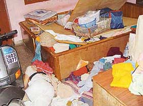 The body of hawker Hari Singh lies on the floor of his house in Sector 30-B, Chandigarh