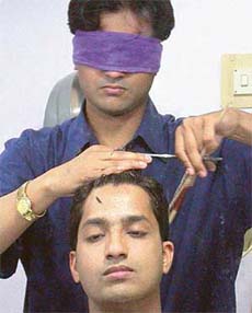 Nadeem shows his candle cut technique of hair styling