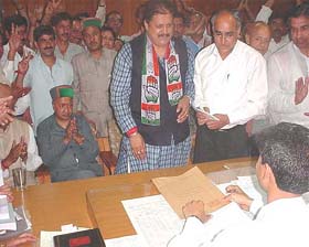 Congress candidate from the Hamirpur Lok Sabha seat Ram Lal Thakur files his nomination papers at Hamirpur on Tuesday