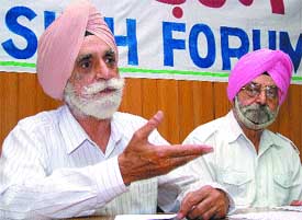 Major Gen M.S.Chadha, working president of Sikh Forum, and Dr. Anup Singh, Vice-President