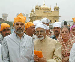 Mr Naresh Gujral, SAD candidate from Jalandhar, along with his father I.K. Gujral and wife Anjali, pays obeisance at the Golden Temple in Amritsar