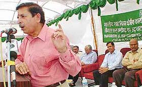 S.K. Tuteja, Food Secretary, Government of India, addresses a meeting at the inauguration of the new FCI building in Sector 31, Chandigarh