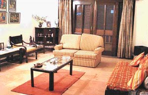 The den on the first floor has been done up in a contemporary style, with a minimalist approach