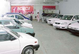 Pre-owned car showrooms are gaining ground in the city