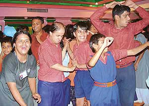 Mentally and physically challenged children from various institutes of the city enjoy a spell of dance at Memorable Moments, a restaurant in Sector 35, Chandigarh
