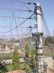 The pole in Sector 48-C, Mohali, where the sparking took place in the evening, can be seen dotted with kundis