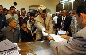 The Congress candidate for the Shimla Lok Sabha seat, Mr Dhani Ram Shandil, files nomination papers in Shimla