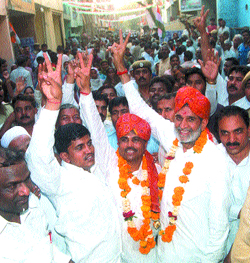 Congress candidate from Outer Delhi Sajjan Kumar with local MLA Jai Kishan during the Padyatra in Sultanpuri area in the Capital on Wednesday.