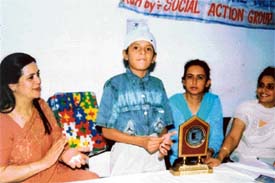 Puneet with his maternal aunt at an awareness programme held at the Ek Prayas